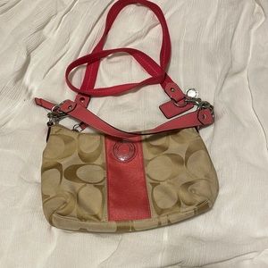 Light pink and brown medium coach handbag